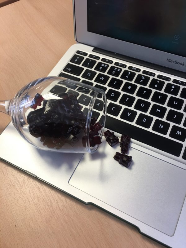 spilled my red wine gummies onto my laptop!