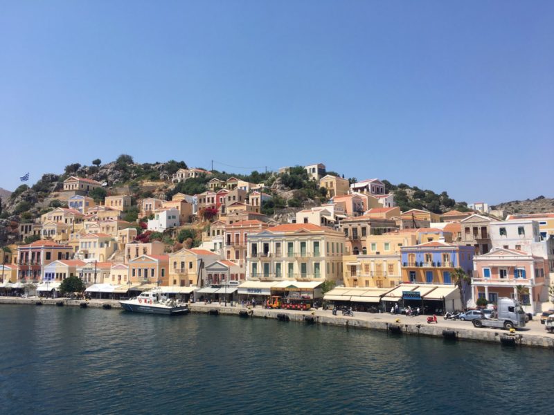Neo-classical mansions line the harbour of Symi Island. 6 places to visit in Rhodes.